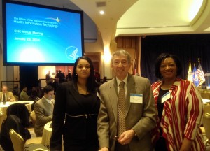 Richard Howe (middle) and Harmona Epps (right) at this morning's signing.
